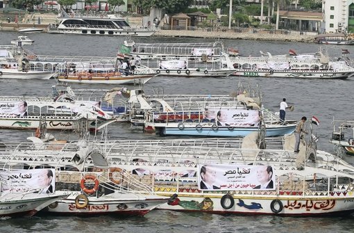 Der omnipräsente Präsidentschaftskandidat: Selbst die Schiffe auf dem Nil sind vollgehängt mit den Wahlkampfplakatenvon Abdel Fattah al-Sisi Foto: dpa