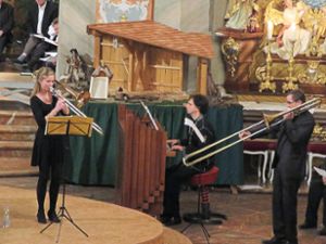 Katharina und Michael Fünfgeld (rechts) an den Blasinstrumenten werden von Martin Groß an der Orgel begleitet. Foto: Bohnert-Seidel